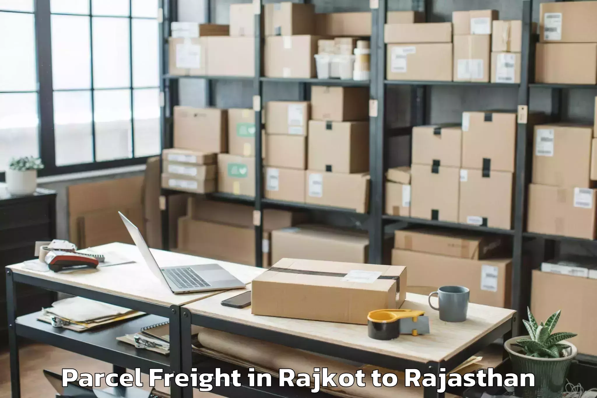 Top Rajkot to Malarna Doongar Parcel Freight Available